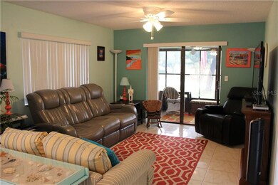 Living room that leads out to the all season lanai