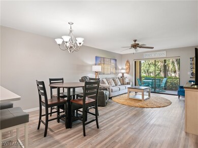 Dining space featuring baseboards, light wood-styl