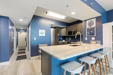 Kitchen with light hardwood / wood-style floors, a