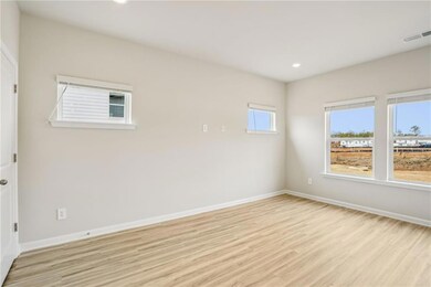 Spare room with light hardwood / wood-style floori