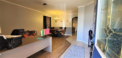 Entering the front door into the living & dining r