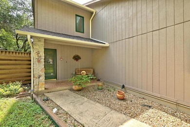 Property entrance featuring roof with shingles