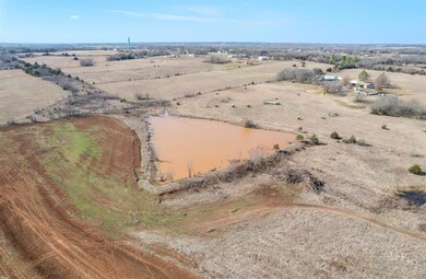 Birds eye view of property featuring a rural view