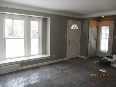 Living Room with Door to Covered Porch