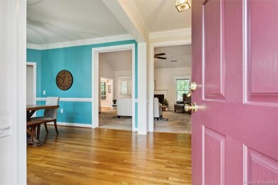 Pretty hardwood floors greet you at the door.