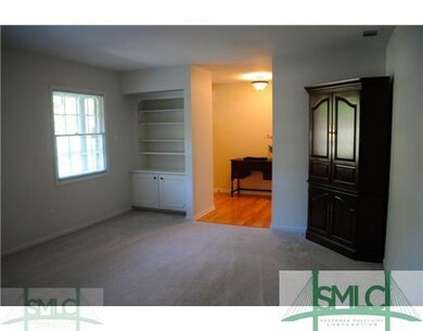 Living Room. Spacious room featuring built-in
