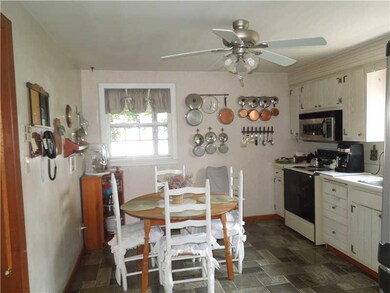 Kitchen. Charming county kitchen with Wood Mode ca