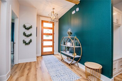 Entry with new modern front door.