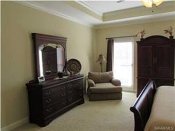 There is room for seating in the master bedroom