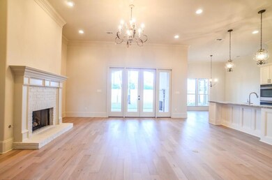 12 ft. ceilings.  Spacious and very open plan.  At