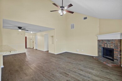 Open concept Living with wood burning fireplace