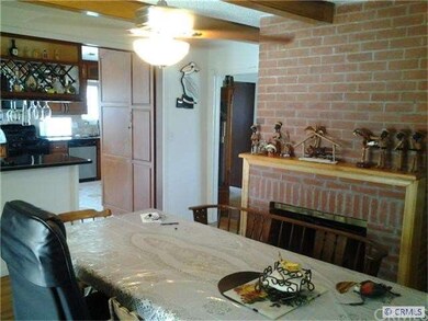 Open to kitchen area and living room, double slidi