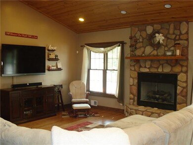 Living Room with Cathedral Ceilings and Skylights 