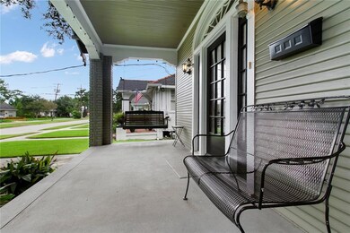 Inviting front porch, perfect for a swing.
