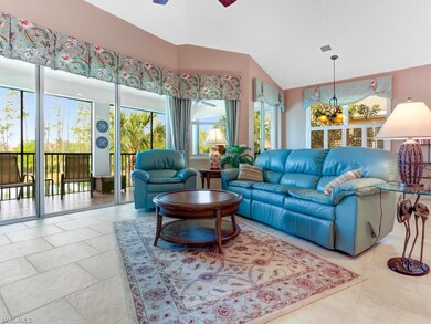 Great room includes custom window treatments.