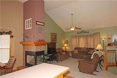 3 Sided Fireplace is a focal point for the main le