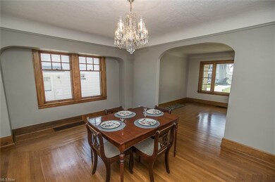 Dining room with hardwood flooring