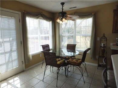 Drink your coffee and look out the window at the beautiful backyard.