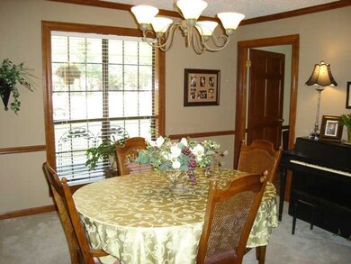 Formal Dining Room Features Chair Rail and Crown M