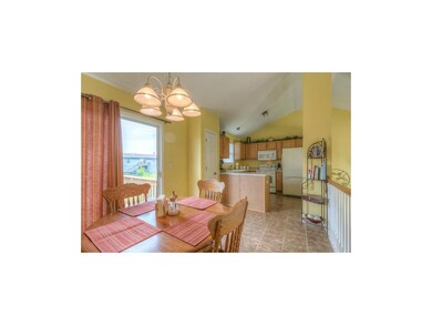 Access to back deck from kitchen & dining area