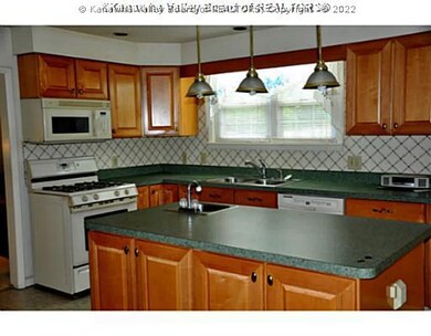 Kitchen. GAS RANGE, DISHWASHER, GARABE DISPOSAL AN