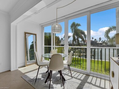 Sunroom with a water view
