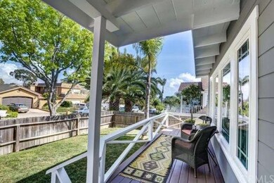 Enjoy peek ocean views from the charming front por
