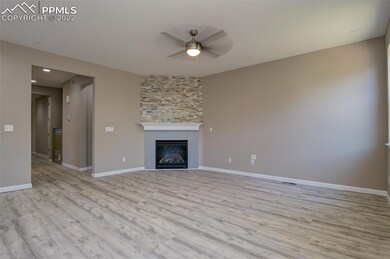 Living Room with updated flooring and beautiful fi