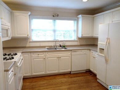 PLENTY OF CABINETS AND BUILT-IN APPLIANCES