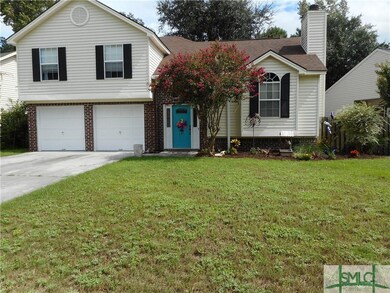 Front View with large 2 car garage and area for wo