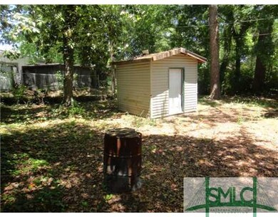Exterior Front. Spacious and shaded back yard, wit