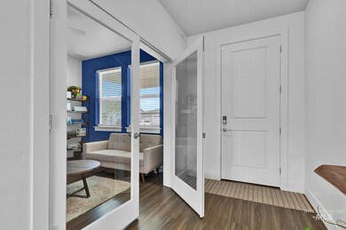 Entryway with wood finished floors