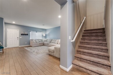 Stairway featuring recessed lighting, baseboards,