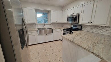 New granite and subway tile backsplash!  Seller is