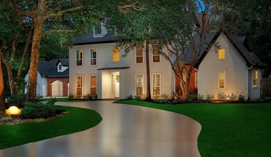 Circular drive with three-car garage