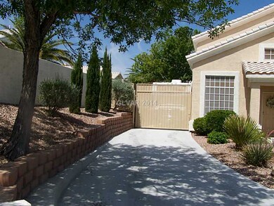 Facade/Exterior Front. Full concrete driveway with