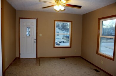 Notice the large replacement windows.
