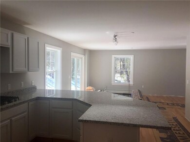 Kitchen open to dining area.
