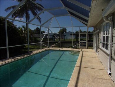 INGROUND POOL WITH CAGE