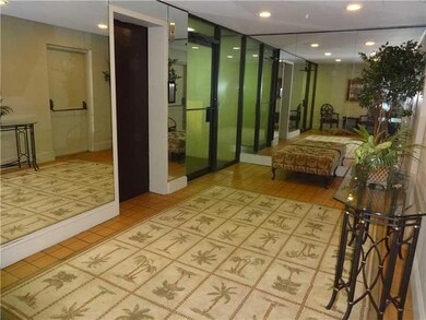 Foyer. Foyer to condo building. Elevator on left