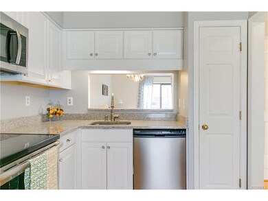 With stainless appliances + pantry
