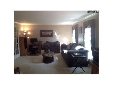 Spacious Living Room with crown molding
