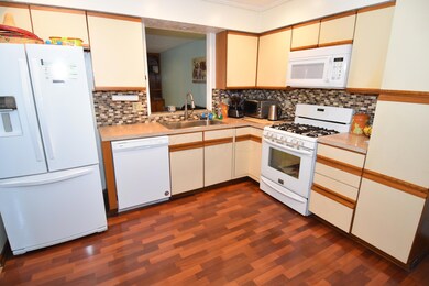 Lots of Cabinet Storage Room for Table