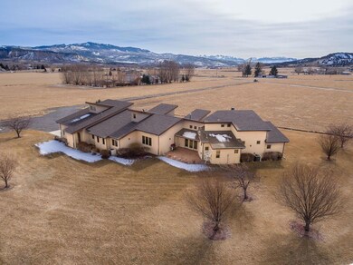 Ad view of house and looking south  Mts
