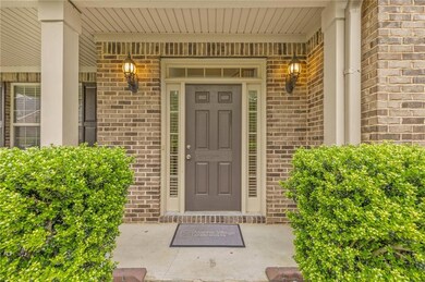Entrance to property featuring brick siding and a 