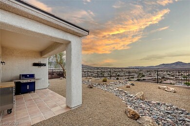 Covered patio and pool sized backyard