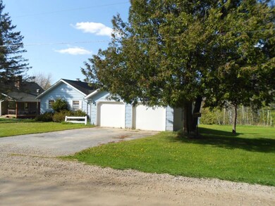 house and garage from roadside