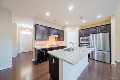 Kitchen with appliances with stainless steel finis