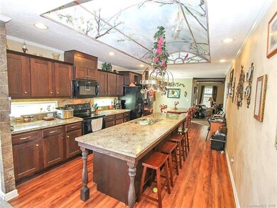 Open kitchen with huge island.