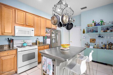 Kitchen Island, Pantry leads to garage